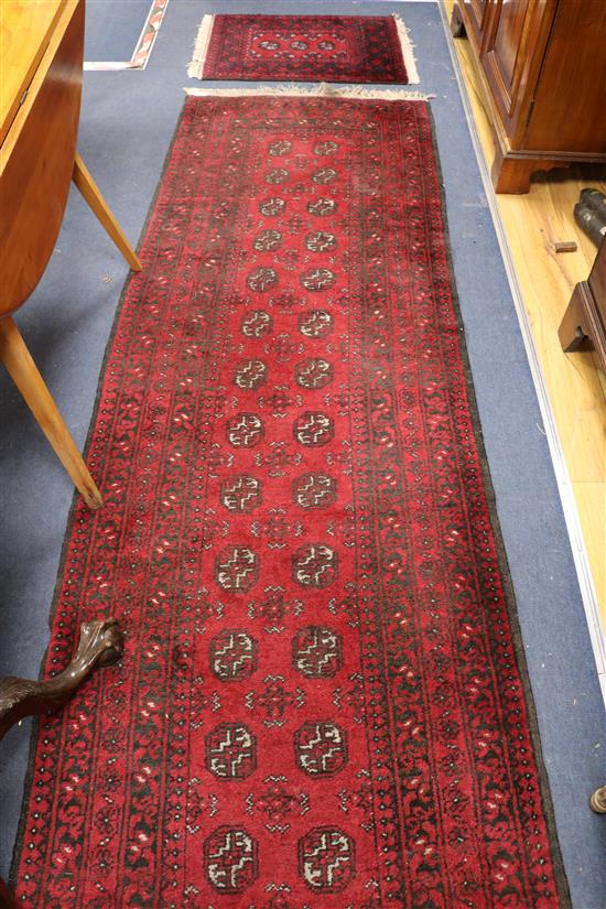 A red ground runner and mat runner 270 x 85cm, Mat 75 x 55cm